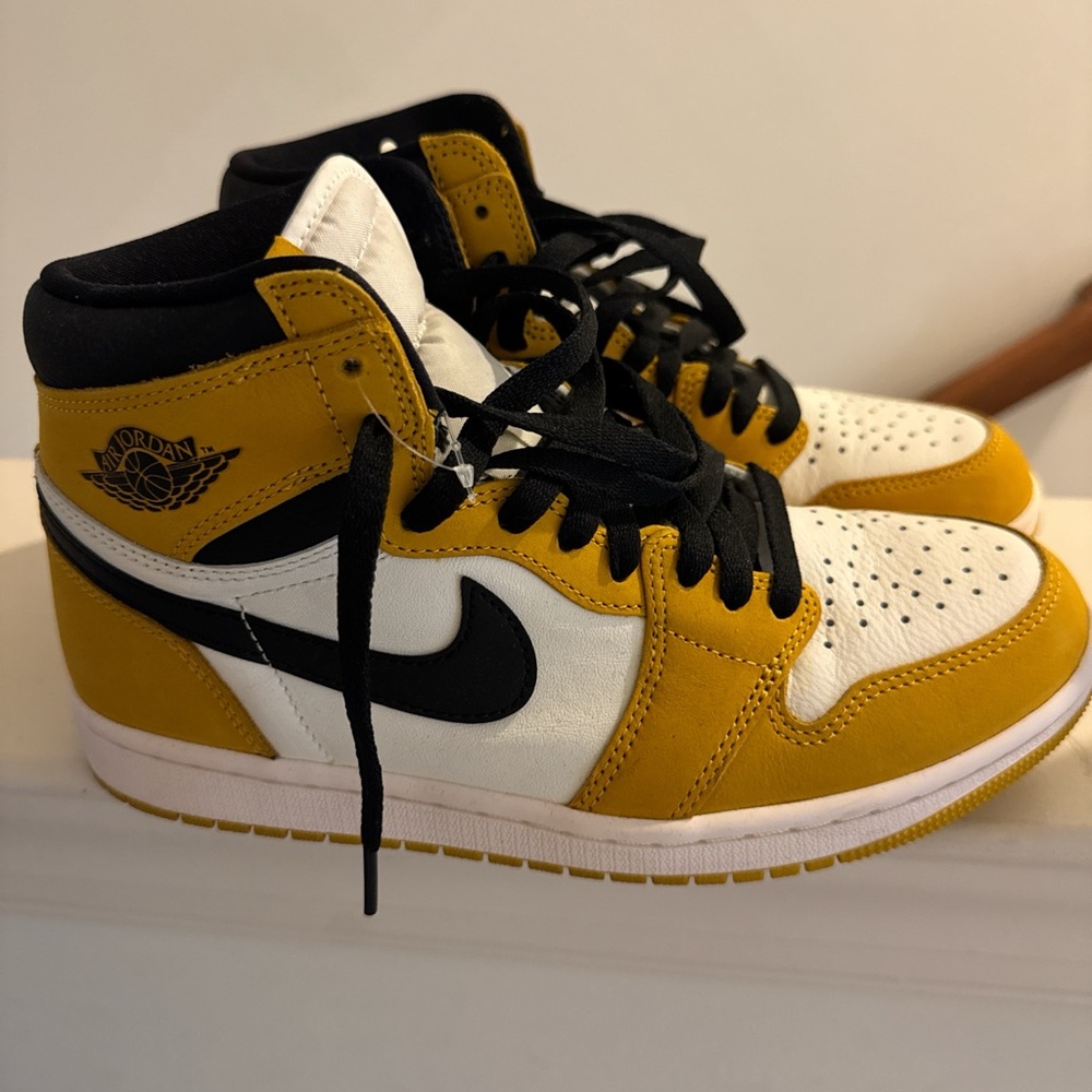 Black and yellow Jordan 1s